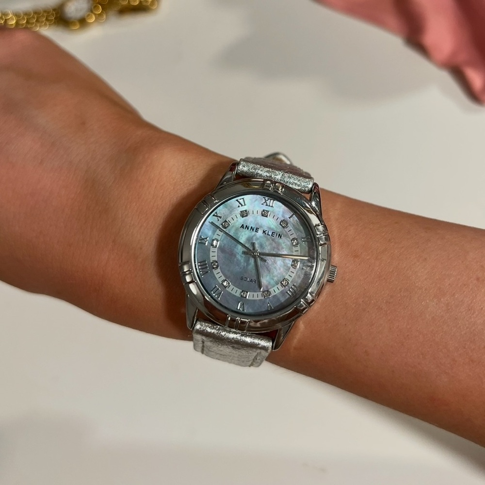 Solar Powered Silver-Tone Watch with Mother-of-Pearl Dial